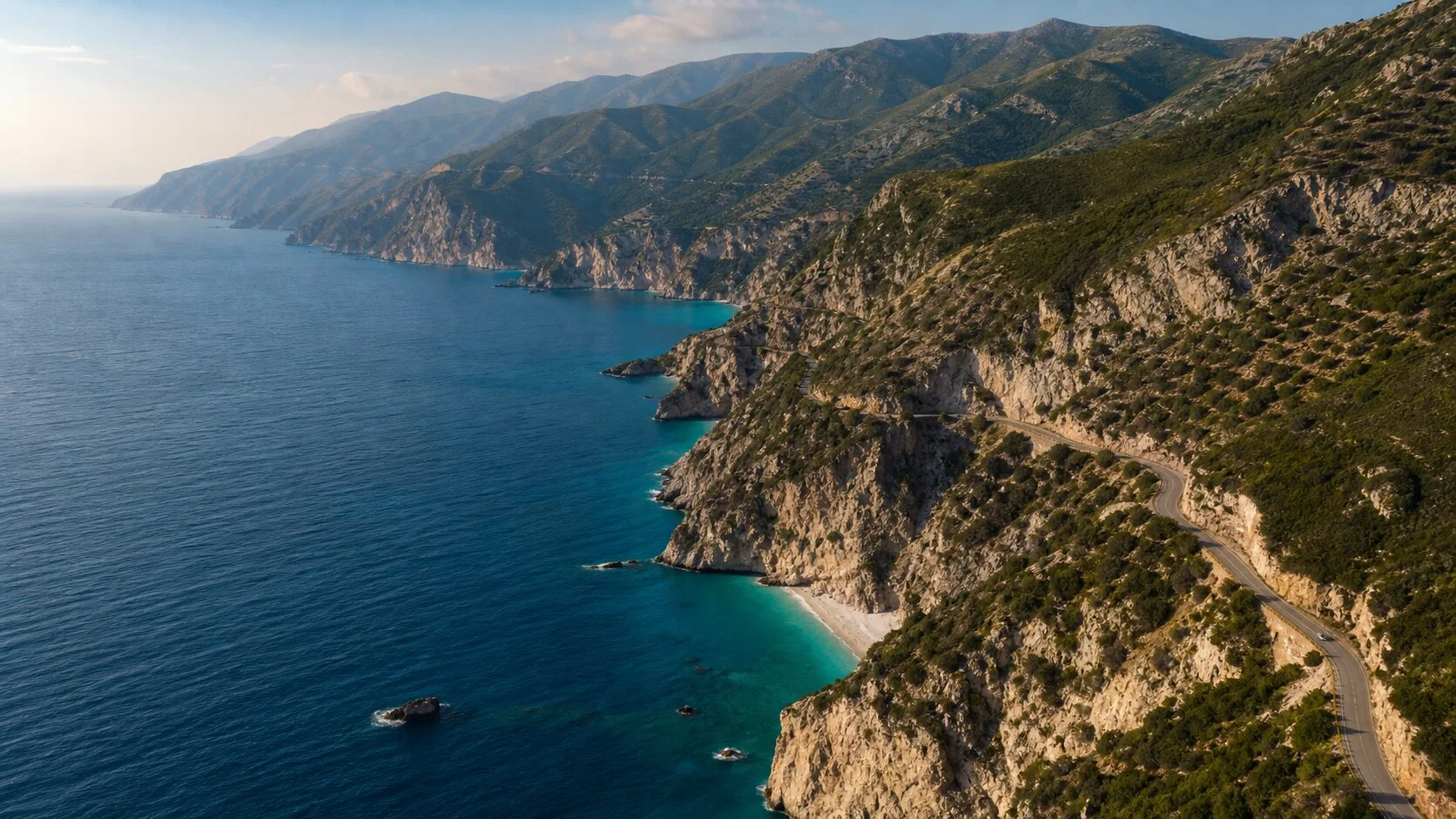 Albanian Riviera coastline with dramatic cliffs and turquoise sea